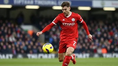Bristol City's Lorent Tolaj was captured crossing past Preston's Liam Lindsay in the 1st September Championship match, a...