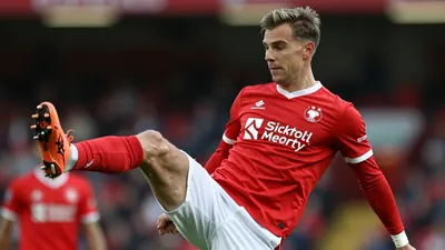 Bristol City's thrilling match against Birmingham ends in 2-2 draw, with Dom Ballard's goal being a highlight